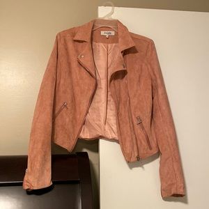 Blazer/Jacket . It looks tan but the lighting is off . It’s a light pink.